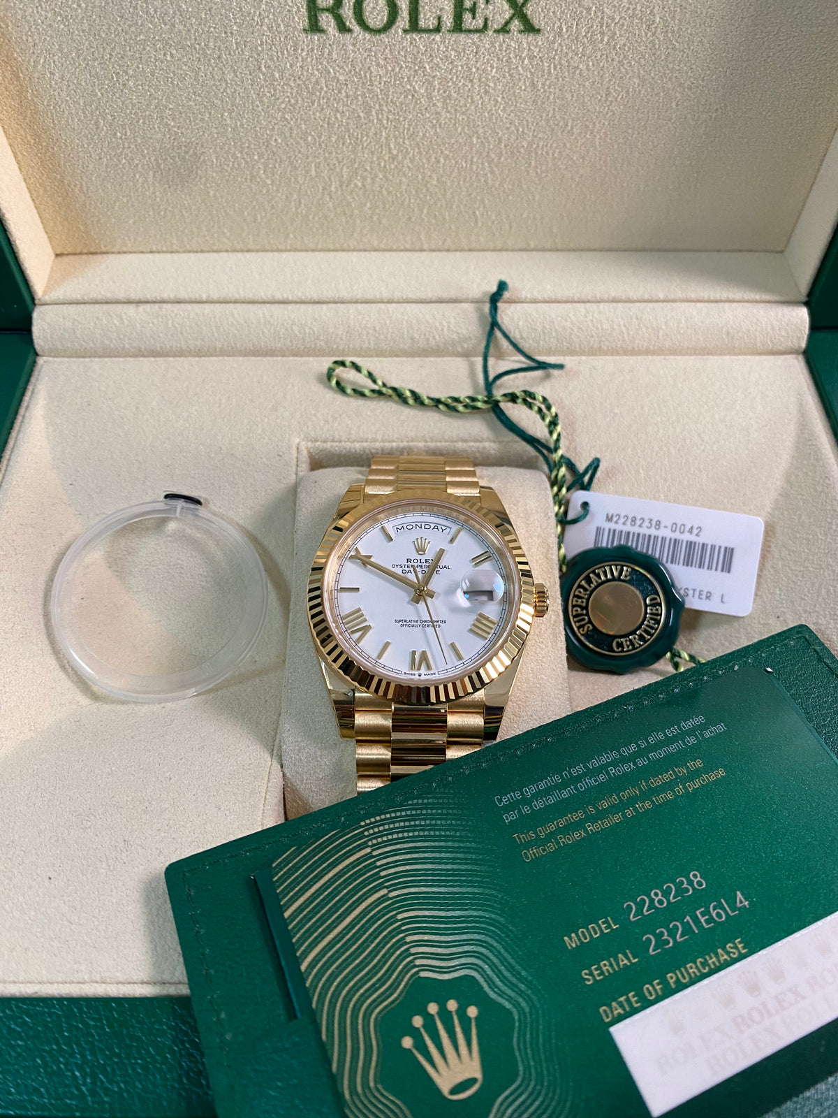 Rolex Yellow Gold Day-Date 40 - 2024 - Fluted Bezel - White Roman Dial - President Bracelet - 228238 *PARTIAL STICKERS*