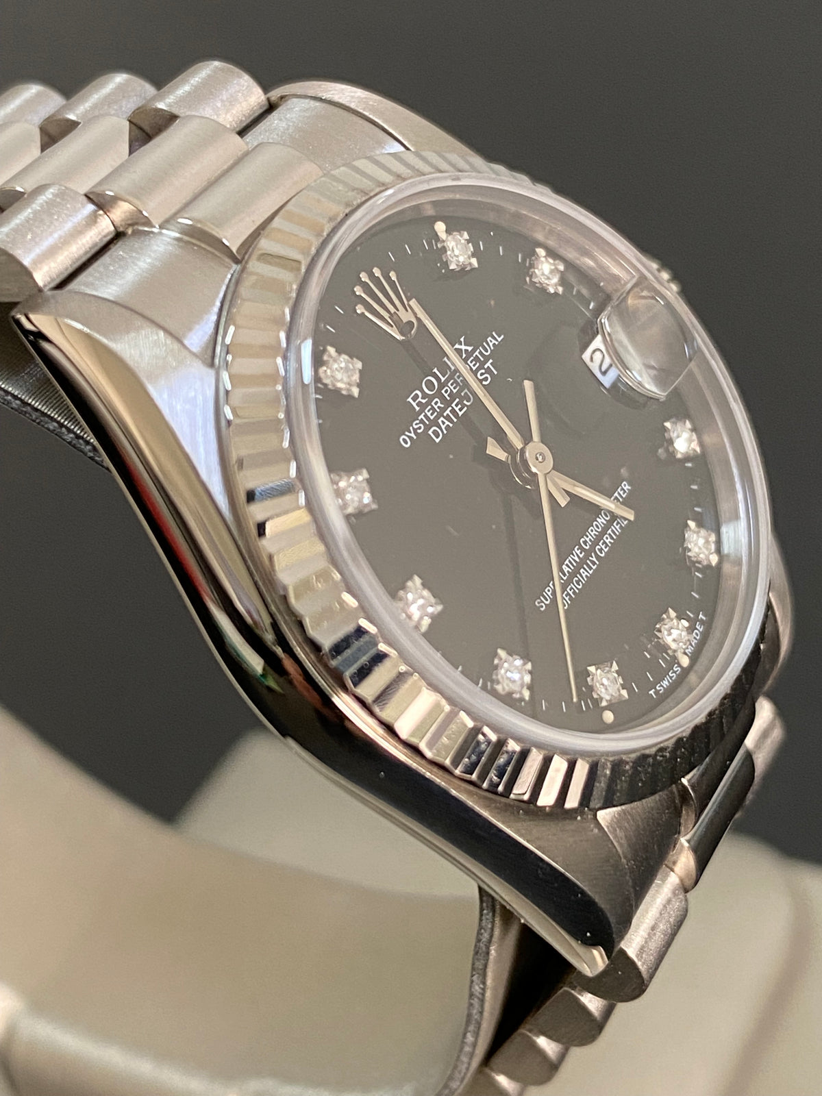 Rolex White Gold Datejust 31 - L Serial - Fluted Bezel - Black Diamond Dial - President Bracelet - 68279