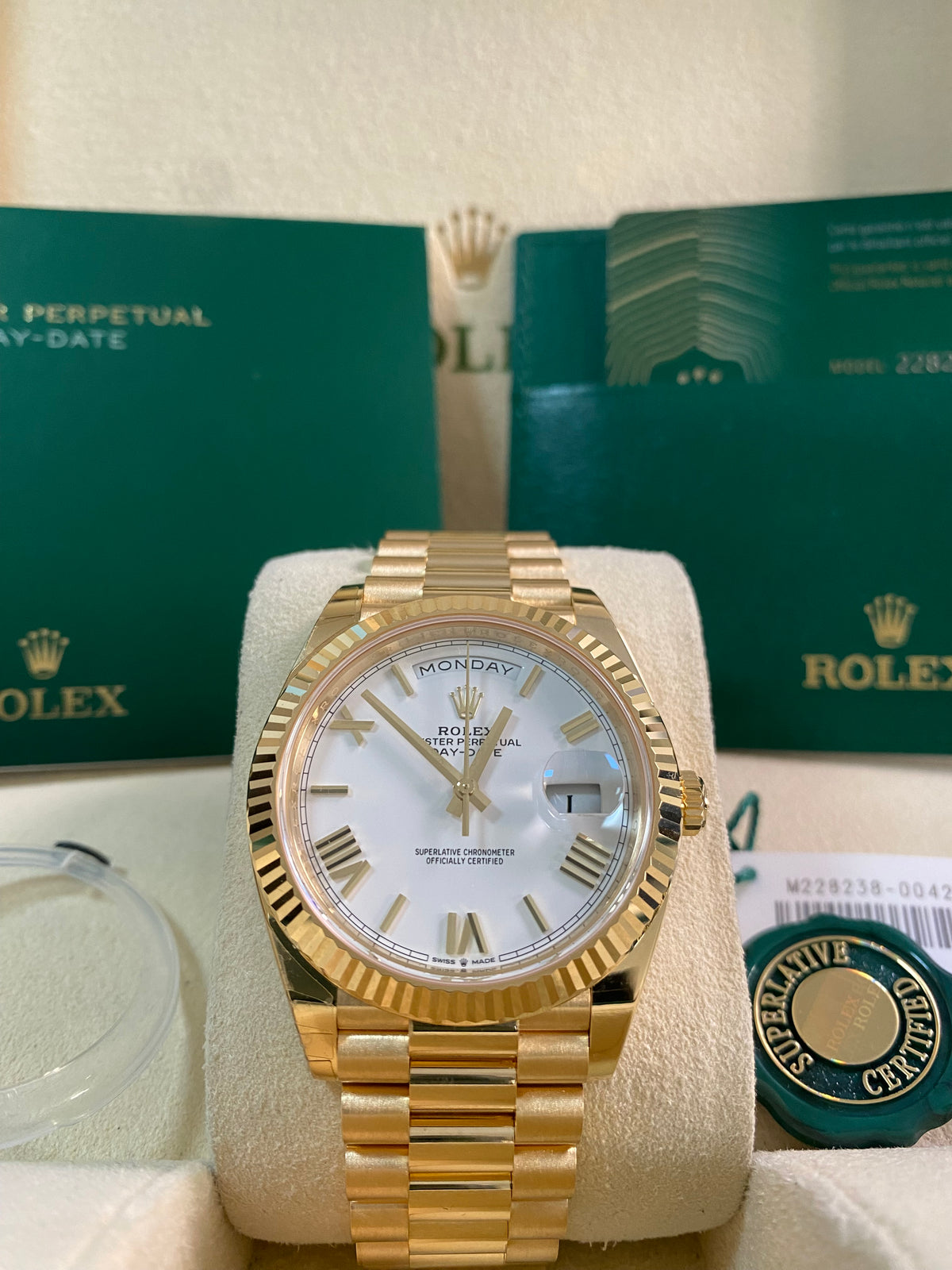 Rolex Yellow Gold Day-Date 40 - 2024 - Fluted Bezel - White Roman Dial - President Bracelet - 228238 *PARTIAL STICKERS*