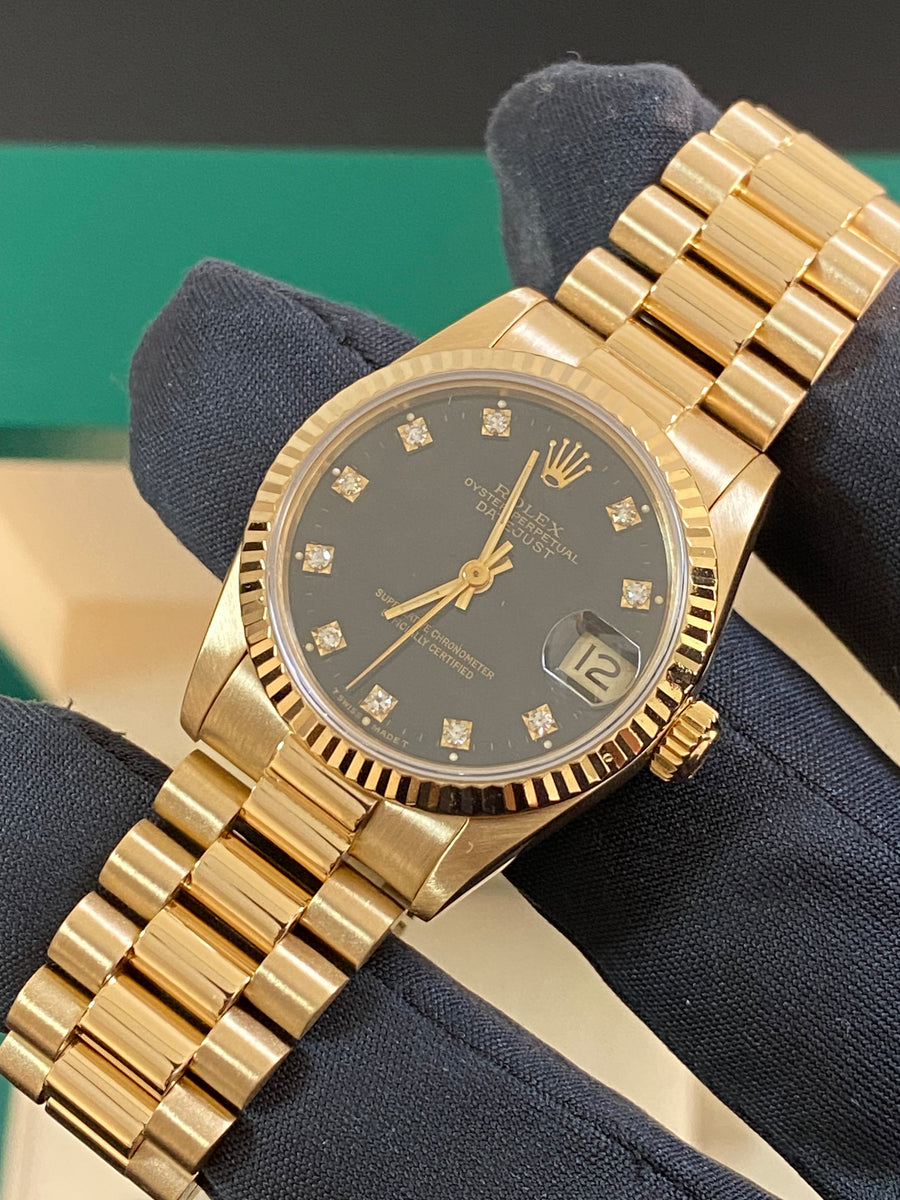 Rolex Yellow Gold Datejust 31 - L serial - Fluted Bezel - Black Diamond Dial - President Bracelet - 68278