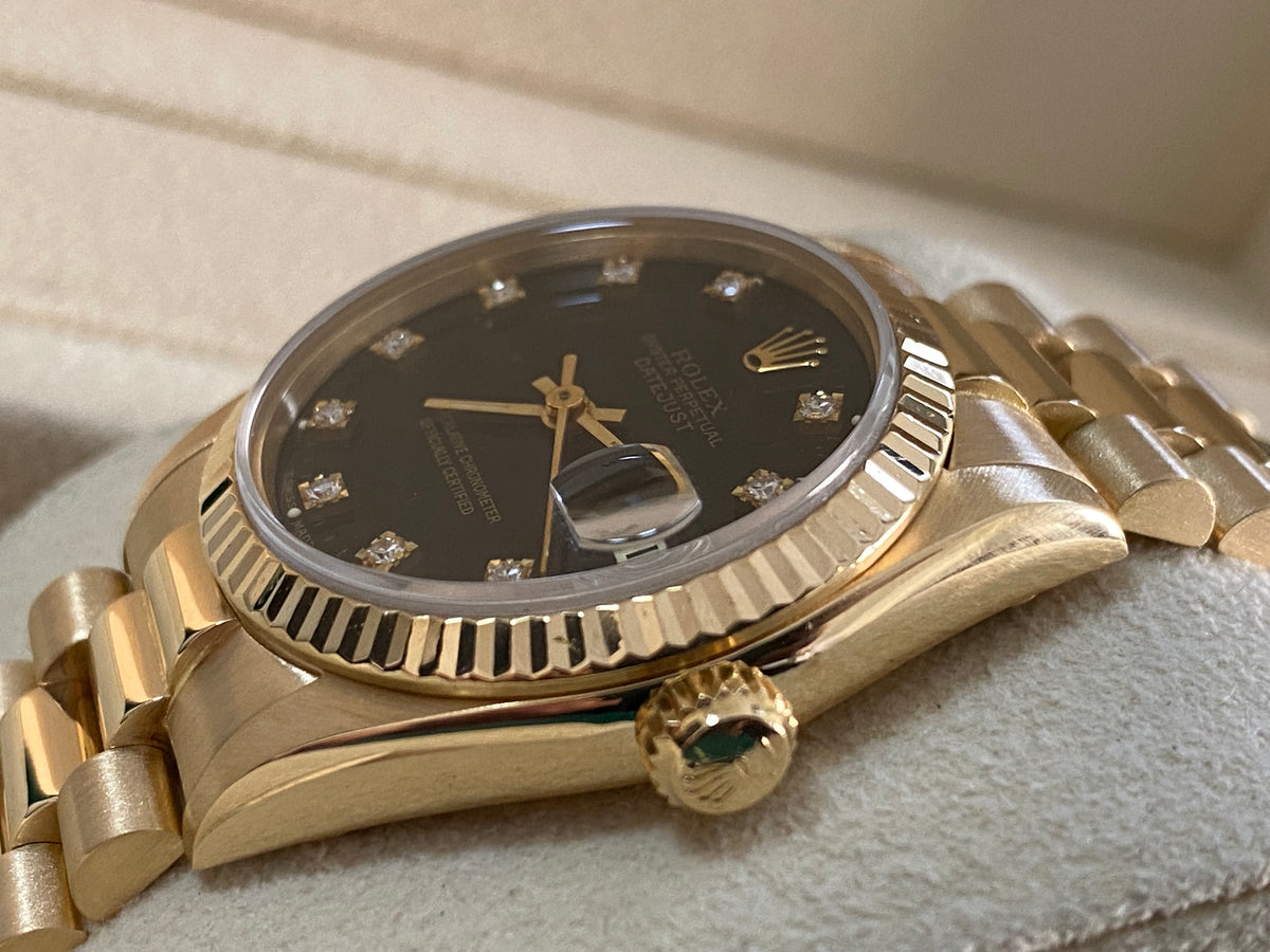 Rolex Yellow Gold Datejust 31 - L serial - Fluted Bezel - Black Diamond Dial - President Bracelet - 68278