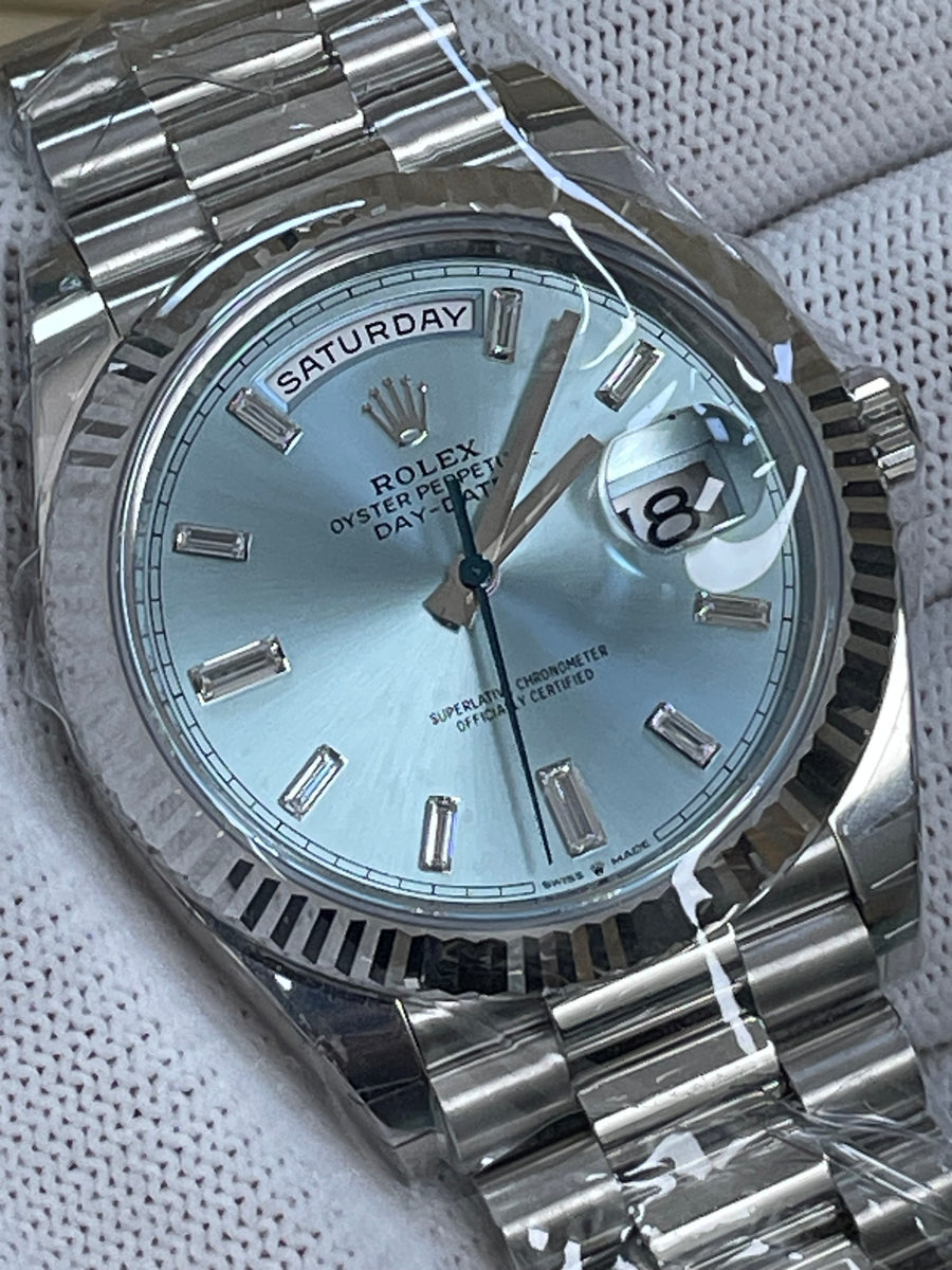 Rolex Platinum Day-Date 40 -  2023 - Fluted Bezel - Ice Blue Baguette Diamond Dial - President Bracelet - 228236