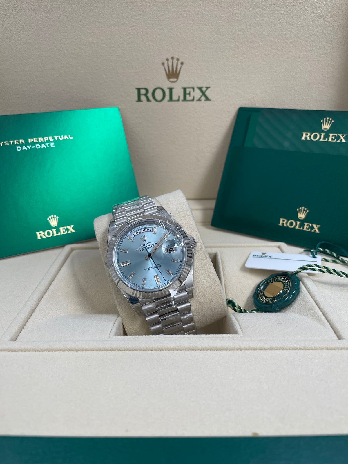 Rolex Platinum Day-Date 40 -  2023 - Fluted Bezel - Ice Blue Baguette Diamond Dial - President Bracelet - 228236