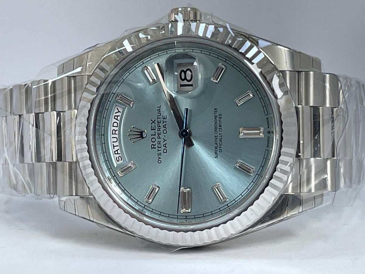 Rolex Platinum Day-Date 40 -  2023 - Fluted Bezel - Ice Blue Baguette Diamond Dial - President Bracelet - 228236