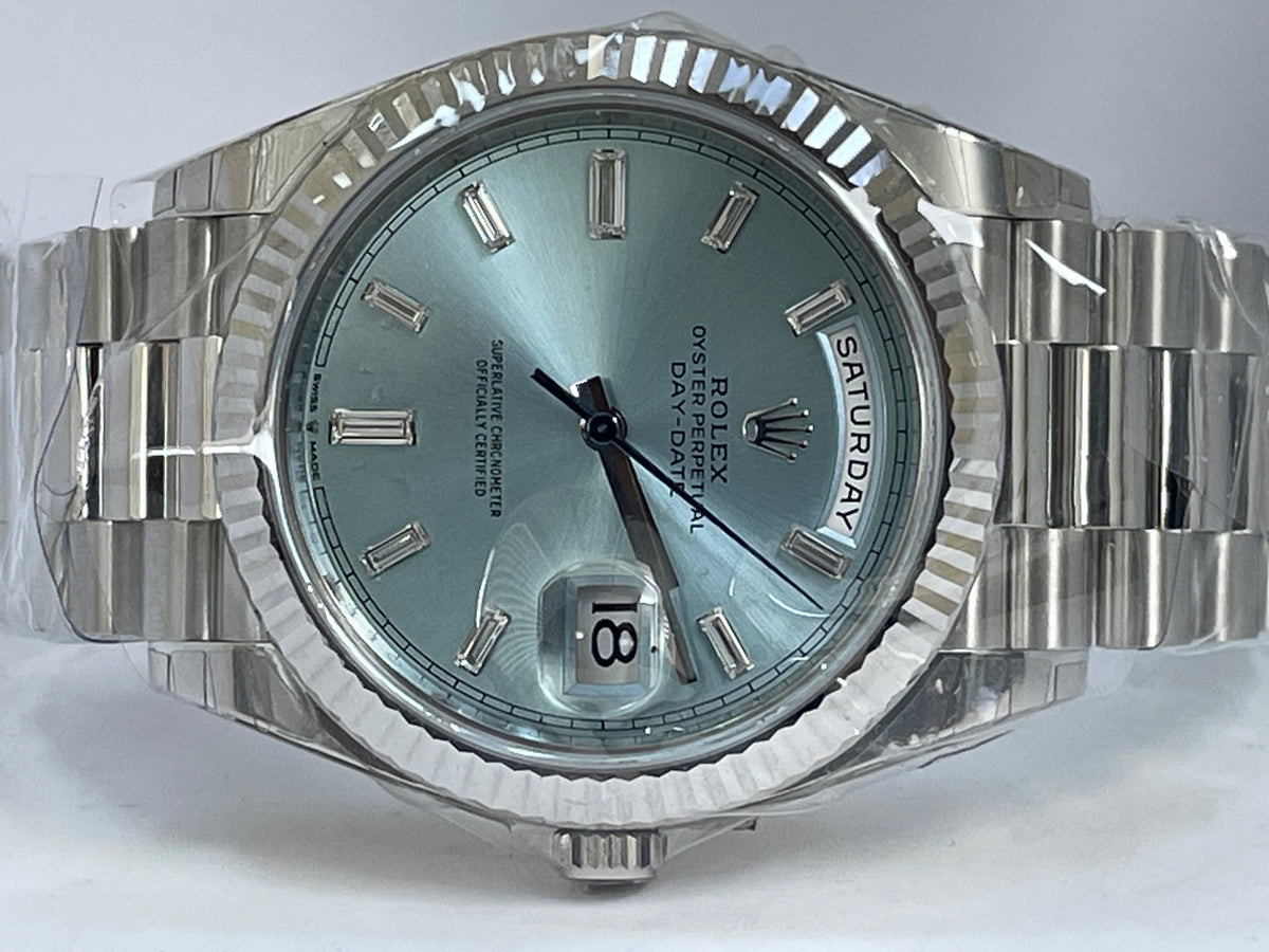 Rolex Platinum Day-Date 40 -  2023 - Fluted Bezel - Ice Blue Baguette Diamond Dial - President Bracelet - 228236