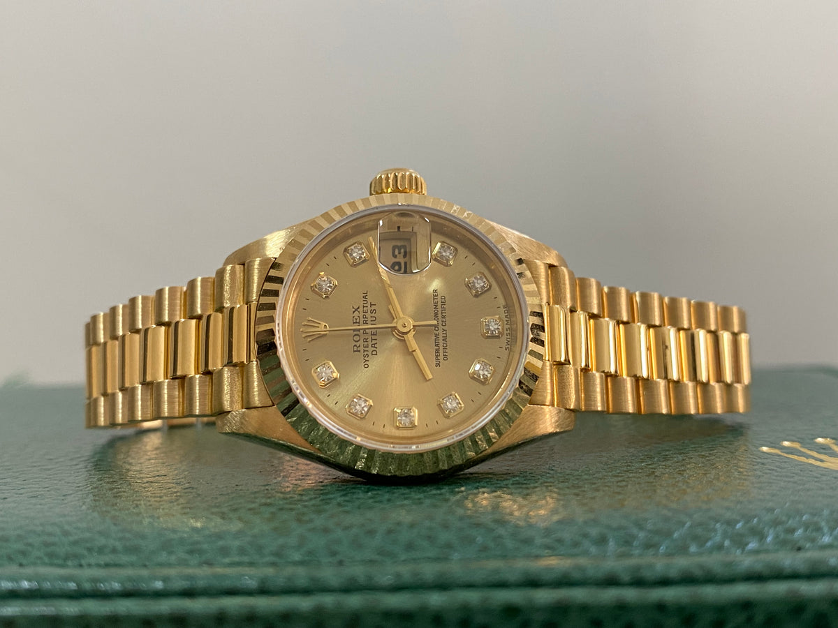 Rolex Yellow Gold Lady-Datejust - W serial - Fluted Bezel - Champagne Diamond Dial - President Bracelet - 69178