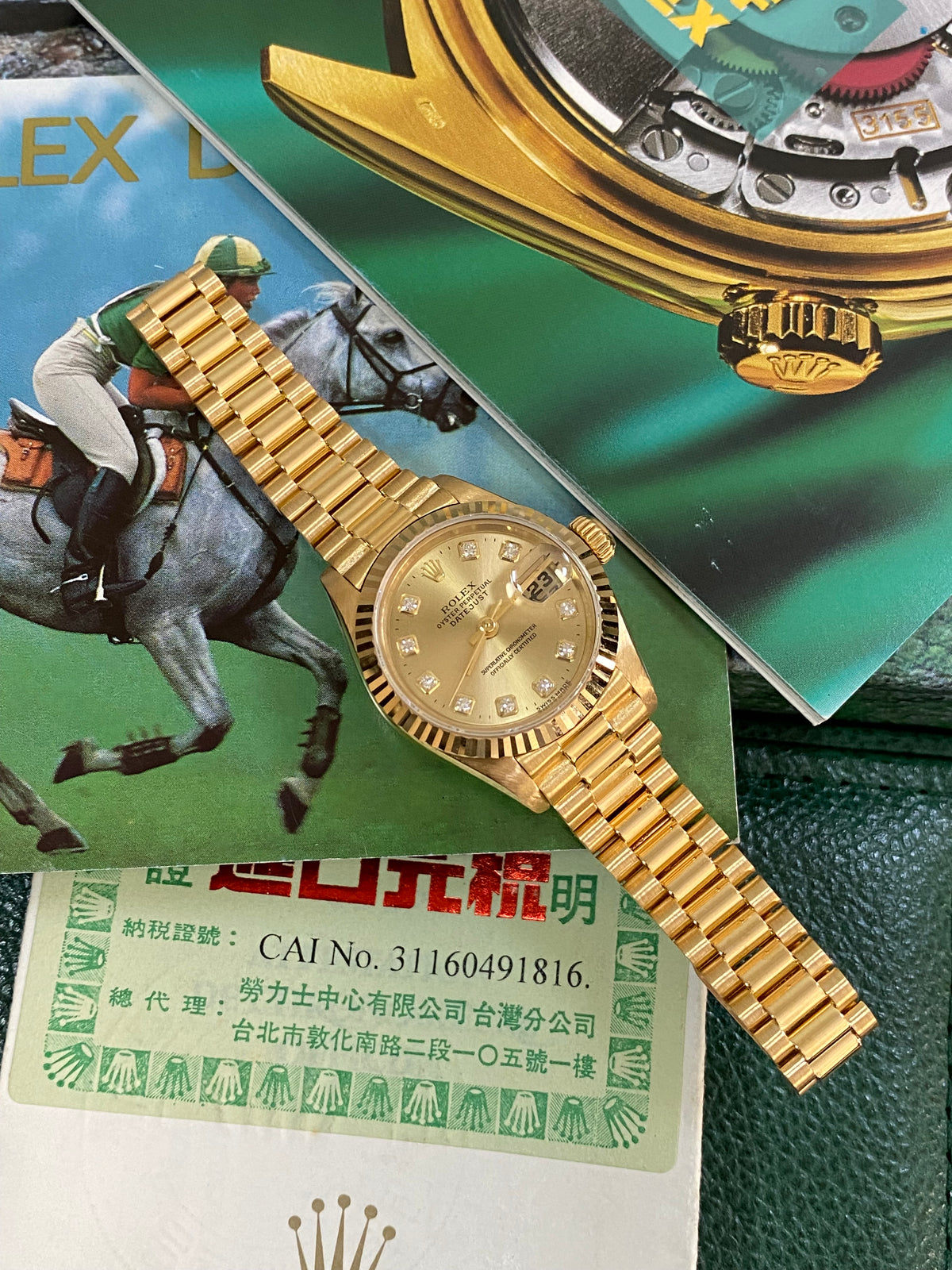 Rolex Yellow Gold Lady-Datejust - W serial - Fluted Bezel - Champagne Diamond Dial - President Bracelet - 69178