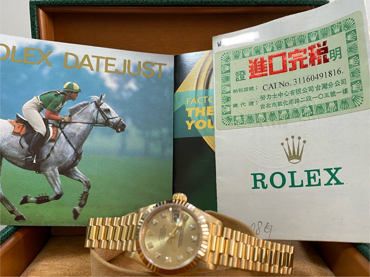 Rolex Yellow Gold Lady-Datejust - W serial - Fluted Bezel - Champagne Diamond Dial - President Bracelet - 69178