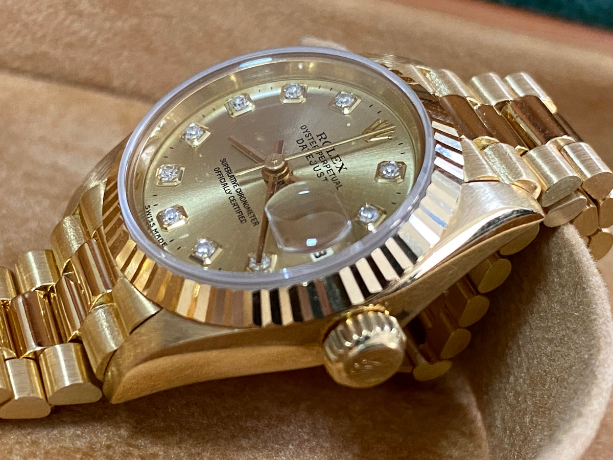 Rolex Yellow Gold Lady-Datejust - W serial - Fluted Bezel - Champagne Diamond Dial - President Bracelet - 69178