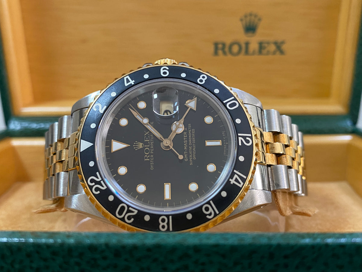 Rolex Steel and Yellow Gold GMT-Master II - L serial - Pre Ceramic Bezel - Black Dial - Jubilee Bracelet - 16713