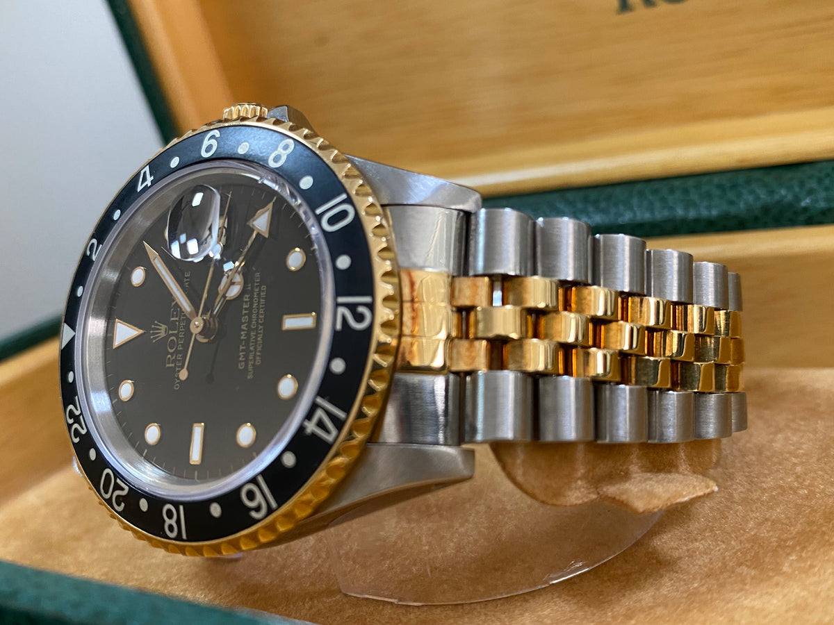 Rolex Steel and Yellow Gold GMT-Master II - L serial - Pre Ceramic Bezel - Black Dial - Jubilee Bracelet - 16713