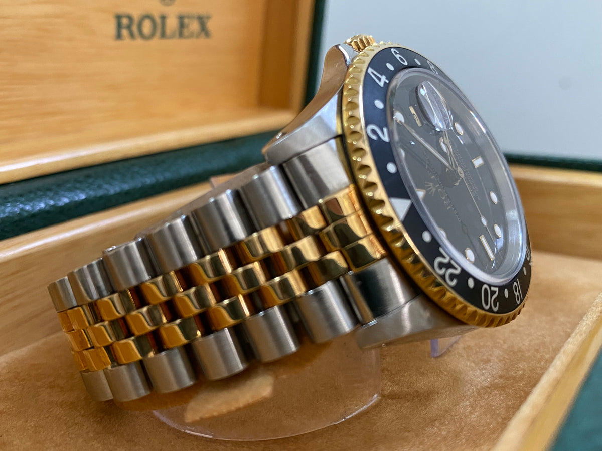 Rolex Steel and Yellow Gold GMT-Master II - L serial - Pre Ceramic Bezel - Black Dial - Jubilee Bracelet - 16713