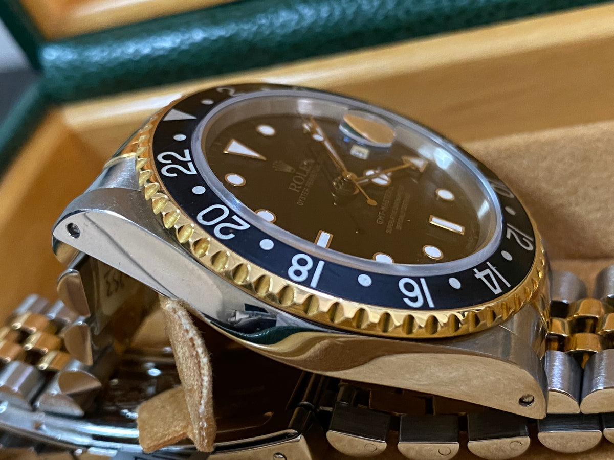 Rolex Steel and Yellow Gold GMT-Master II - L serial - Pre Ceramic Bezel - Black Dial - Jubilee Bracelet - 16713