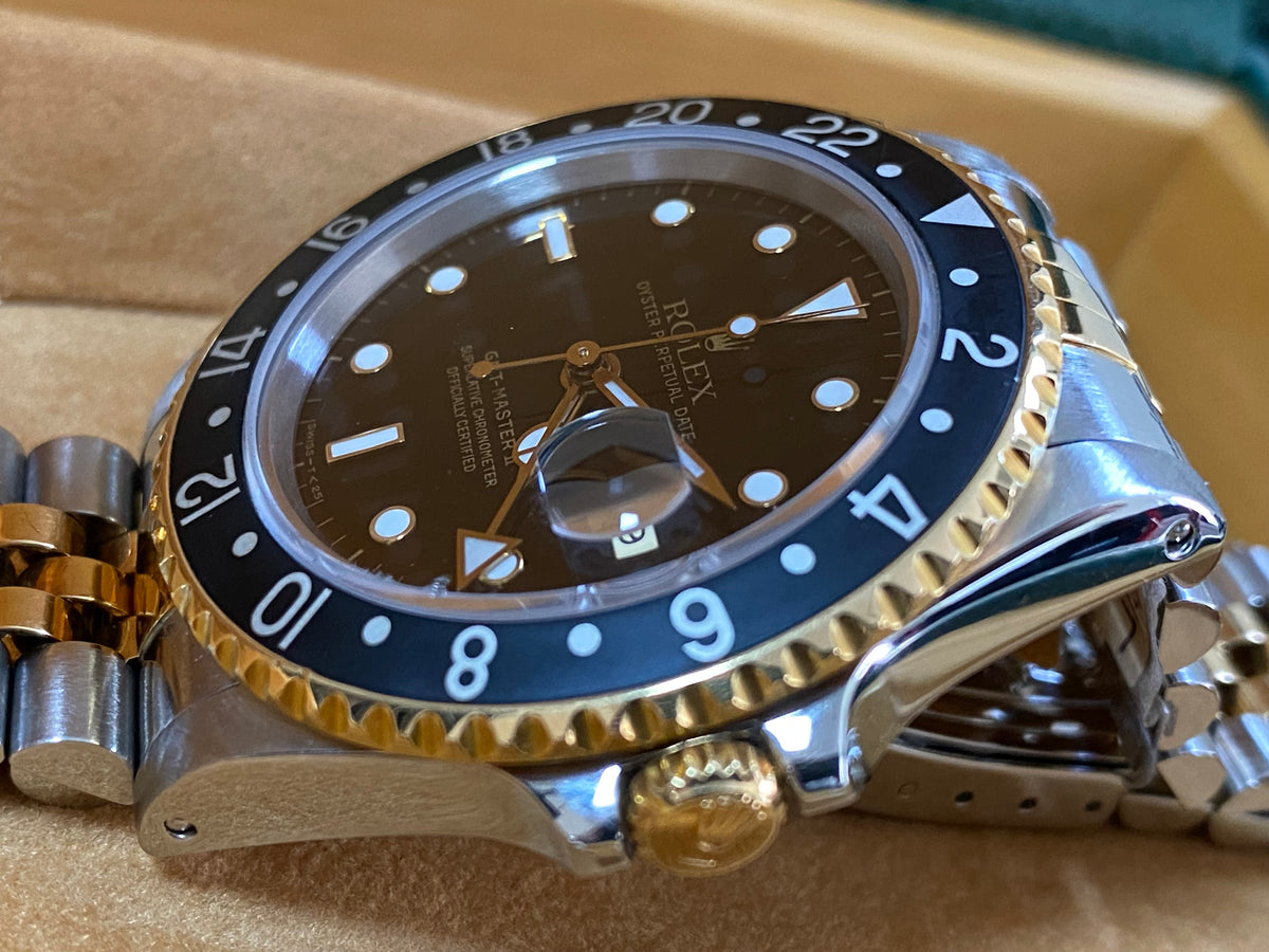 Rolex Steel and Yellow Gold GMT-Master II - L serial - Pre Ceramic Bezel - Black Dial - Jubilee Bracelet - 16713