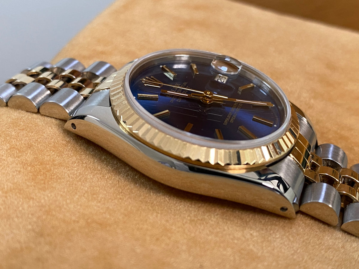 Rolex Steel and Yellow Gold Datejust 31 - R serial - Fluted Bezel - Blue Index Dial - Jubilee Bracelet - 68273