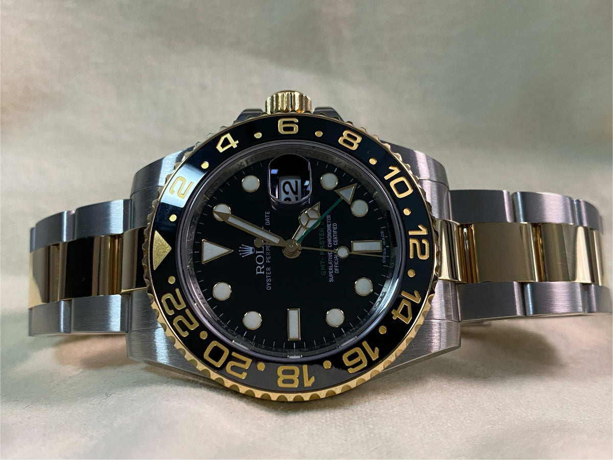 Rolex Steel and Yellow Gold GMT-Master II - V serial - Black Bezel - Black Dial - Oyster Bracelet - 116713LN *FULL SET*