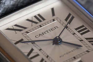 Cartier Tank watch face close up