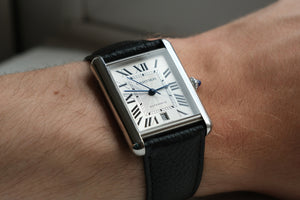 Cartier Tank watch on mans wrist